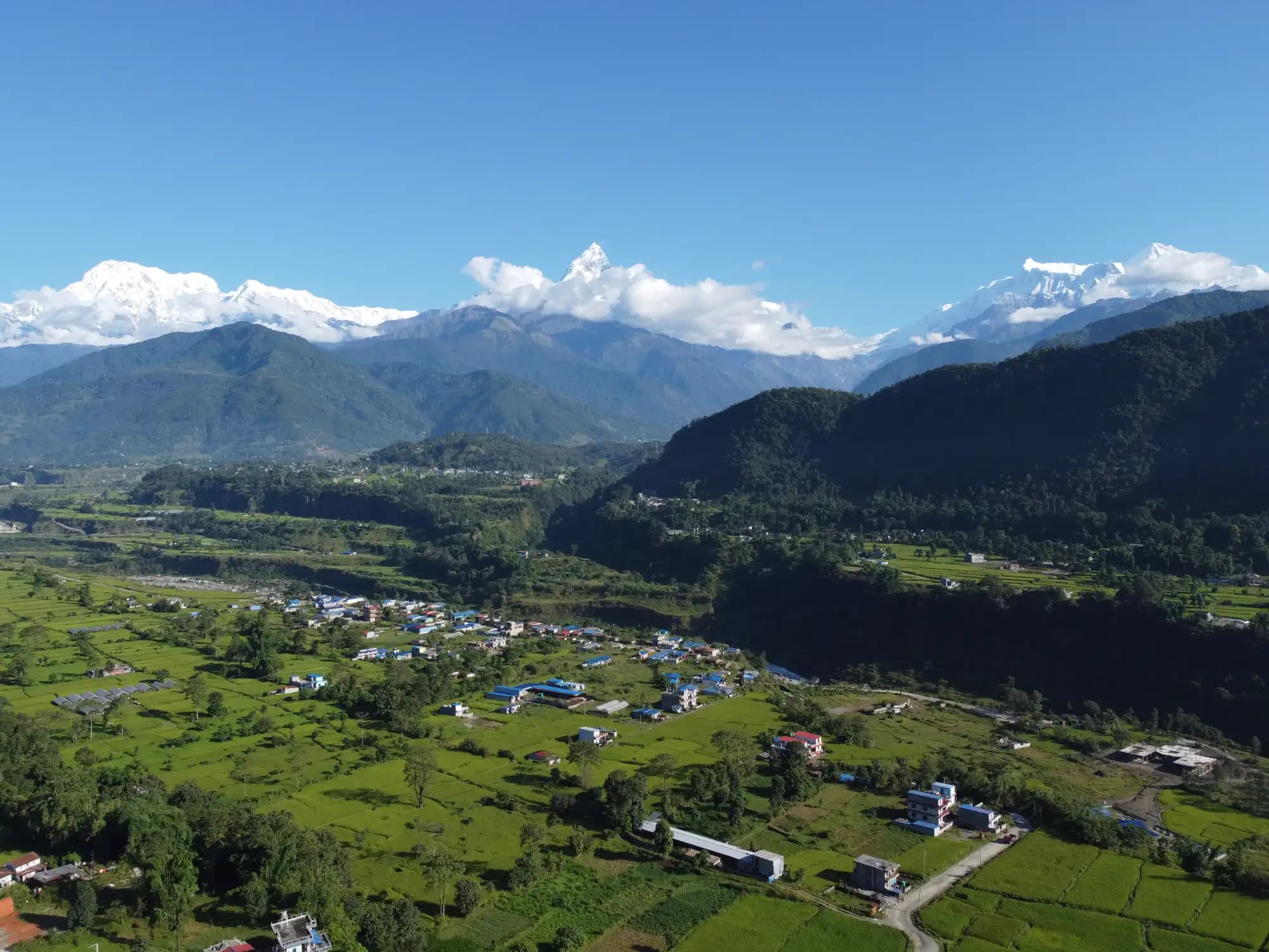 green farm lands seen on the pokhara run