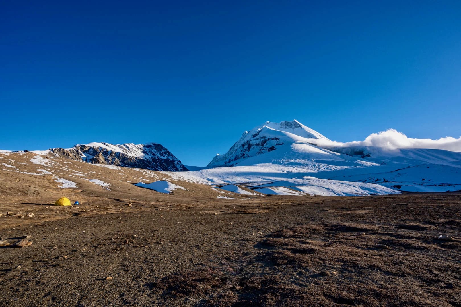Dhaulagiri Circuit trek and its rugged landscapes, windy valley, and snowy peak