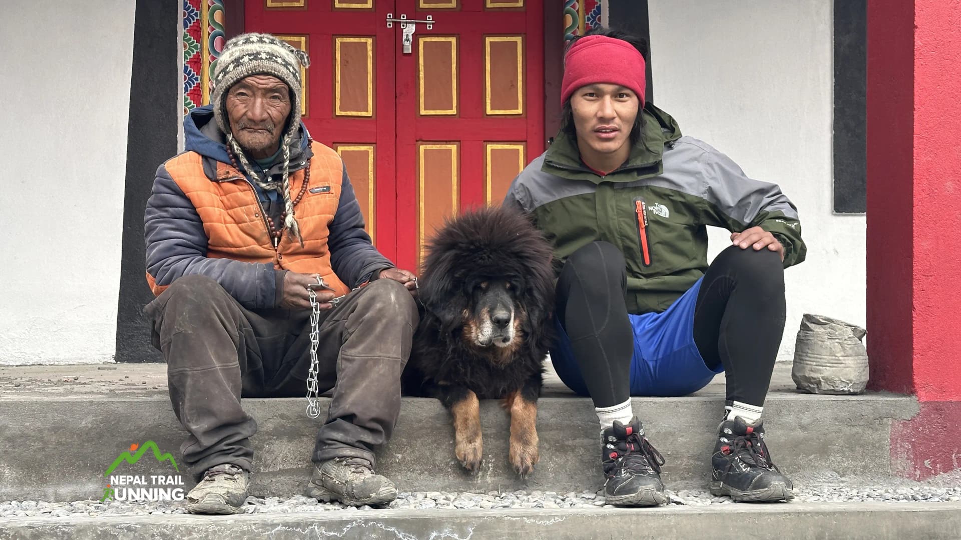 Our guide with the lcoal and Bhote Kukur (local dog breed in the himalayan region of Nepal) at Nar Phu valley